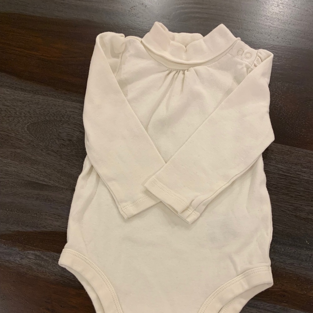 White turtleneck bodysuit